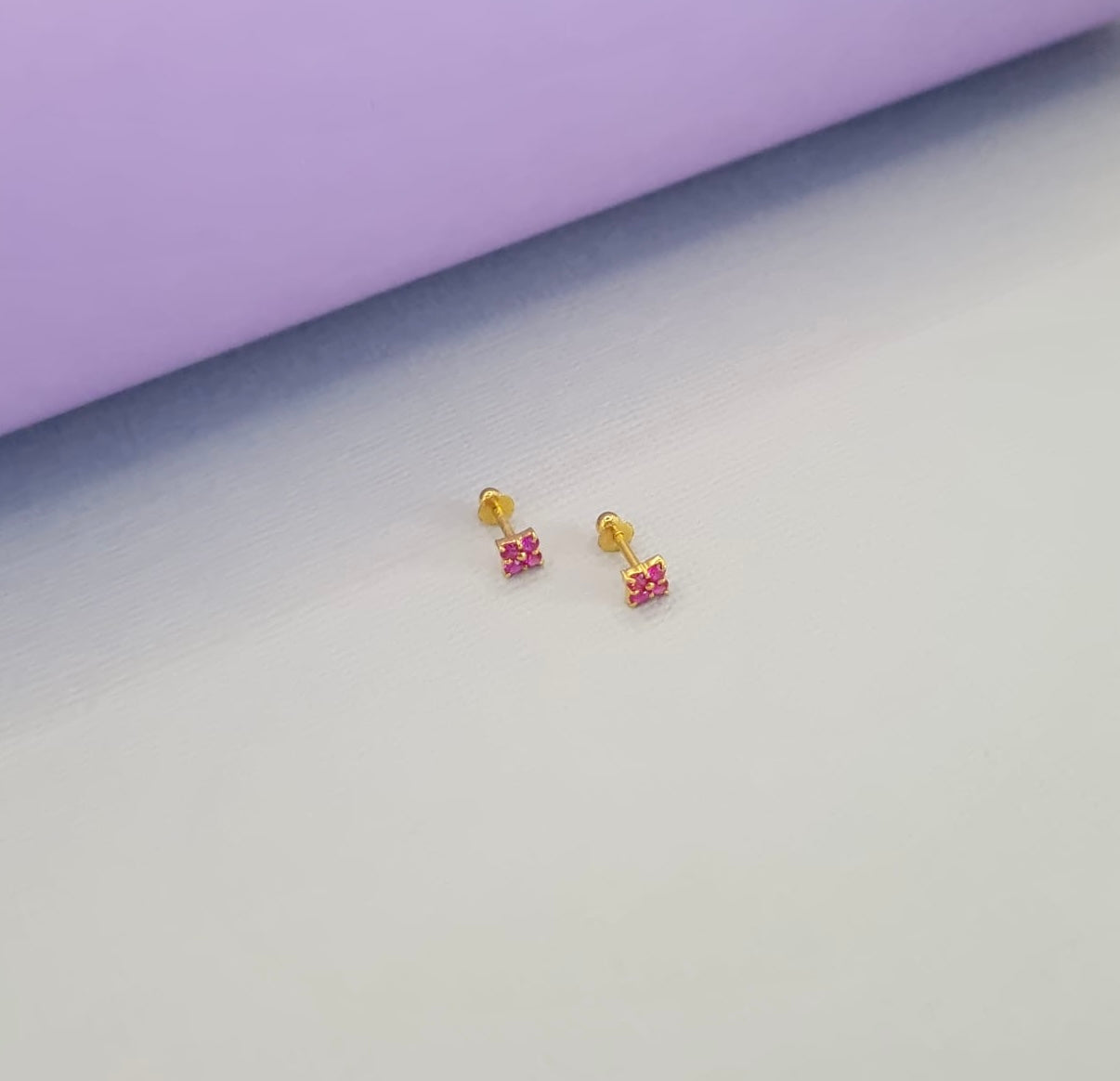 22k solid gold small ruby coloured earrings