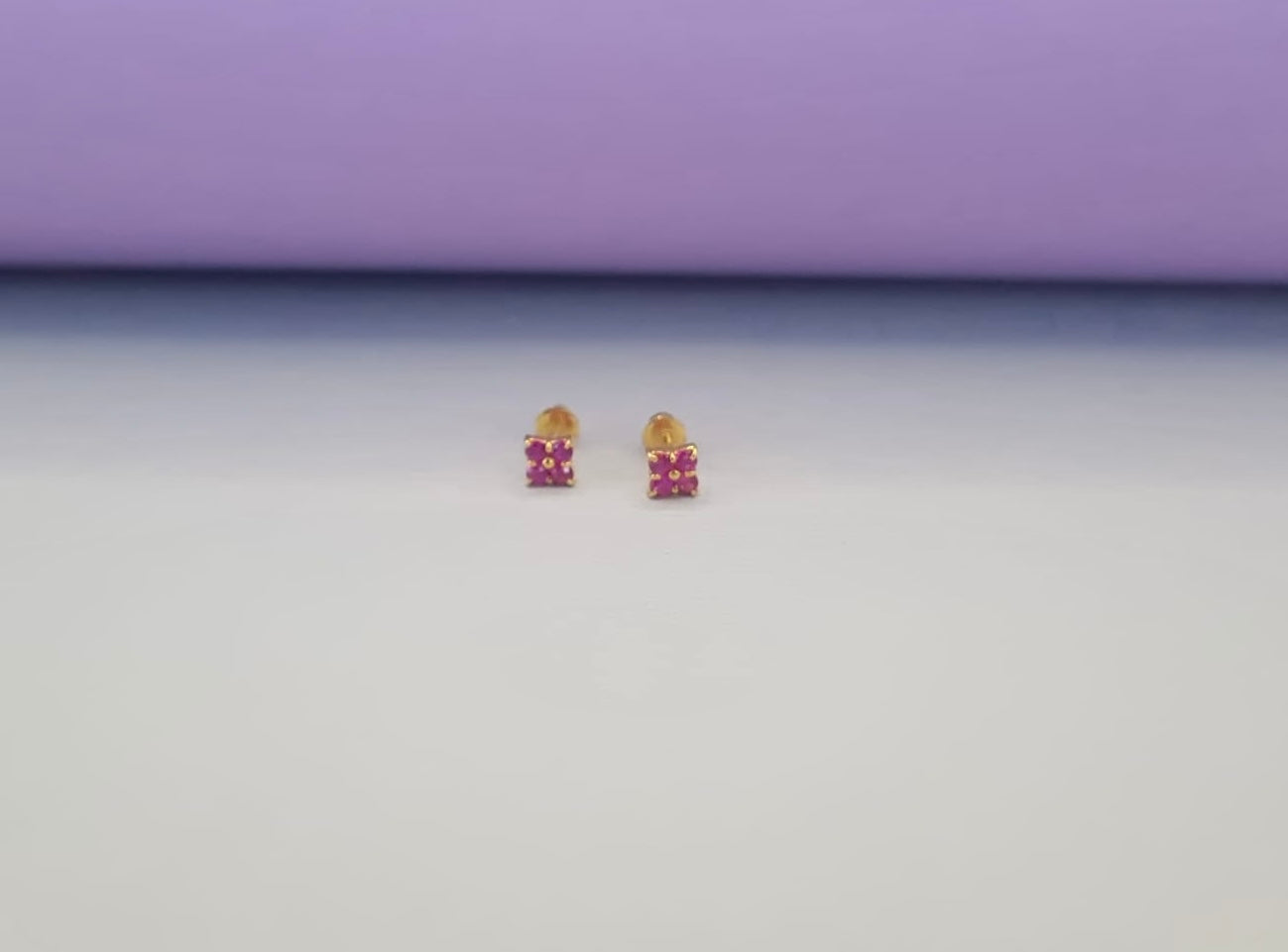 22k solid gold small ruby coloured earrings