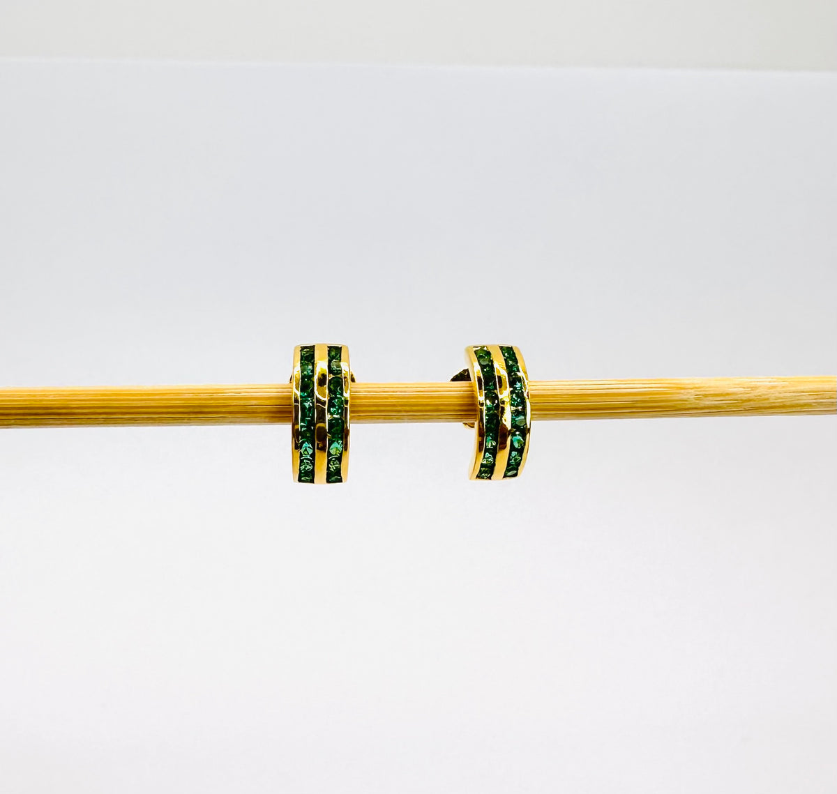 22k Solid Gold Huggie Earrings: Green Cubic Zirconia