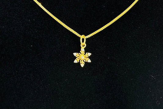 22k solid gold snow flake pendant only