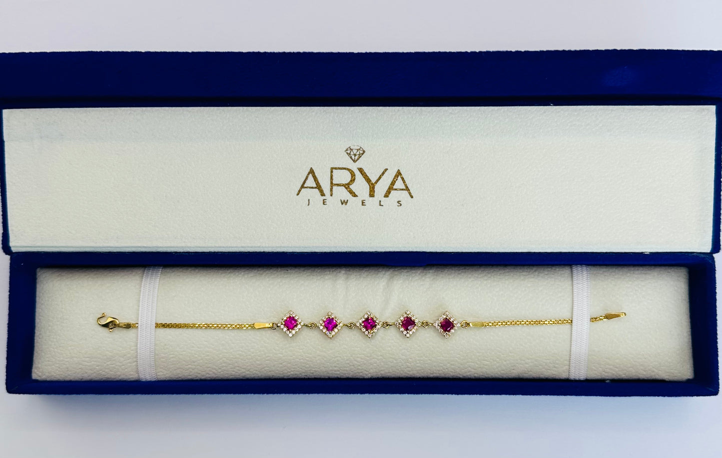22k solid gold designer bracelet with white and ruby colour CZ