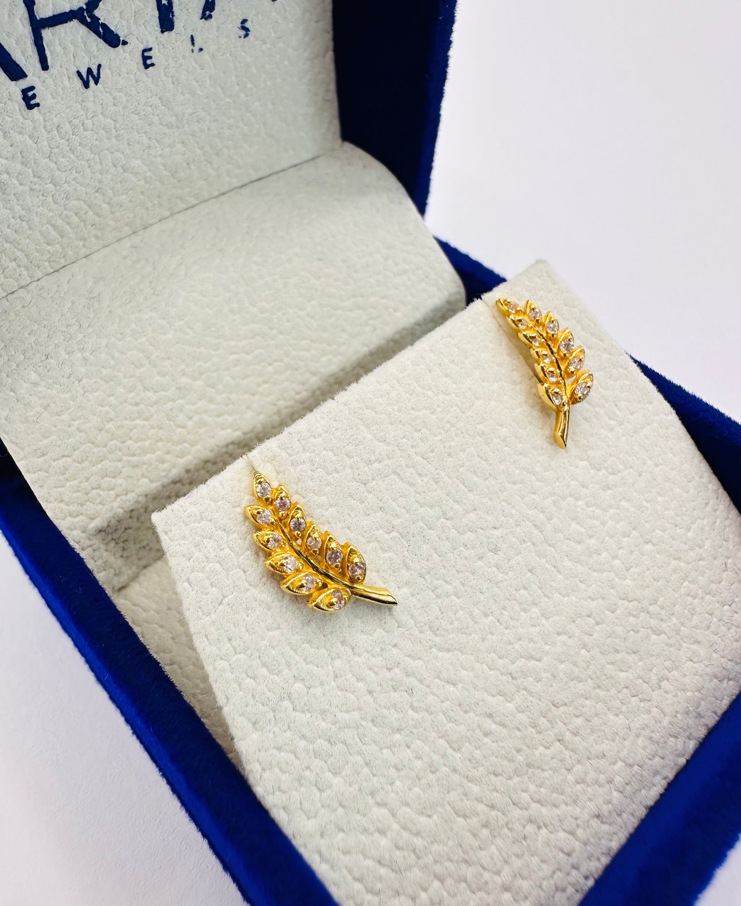 22k solid gold studded leaf earrings
