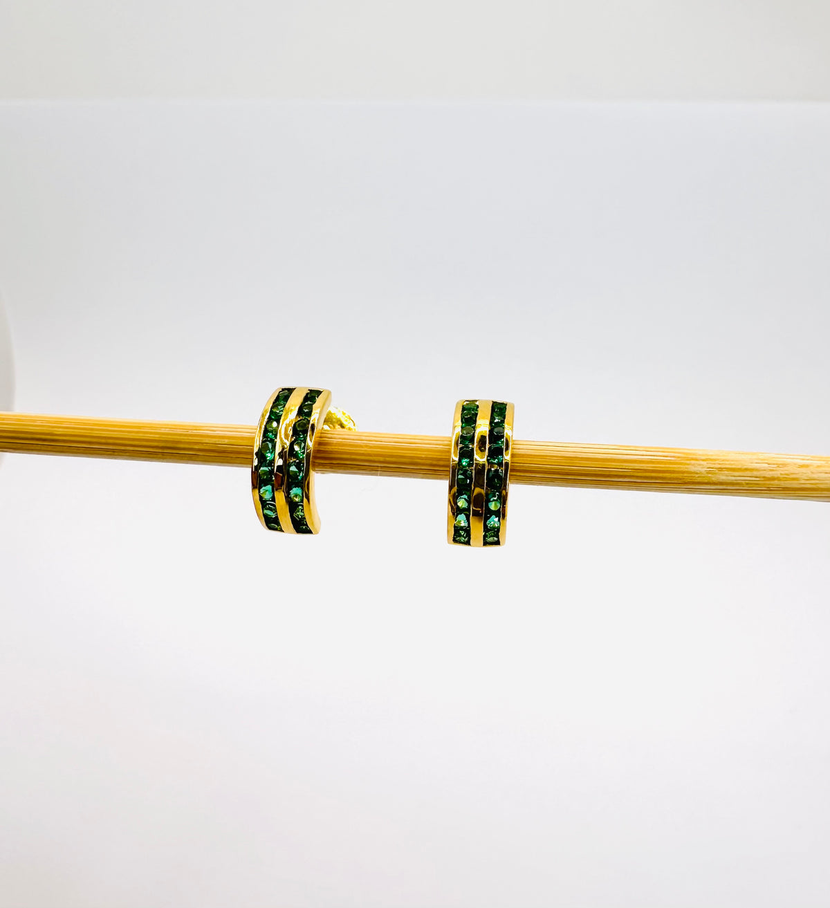 22k Solid Gold Huggie Earrings: Green Cubic Zirconia